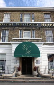 
a building with a sign on the front of it at Great Northern Hotel; Sure Hotel Collection by Best Western in Peterborough
