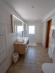Ένα μπάνιο στο Landhotel - Apartments Bauer