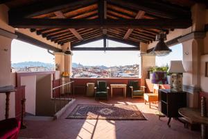 a living room with a view of a city at Stella d'Italia in Florence