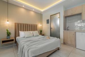 Postel nebo postele na pokoji v ubytování Maria Hotel