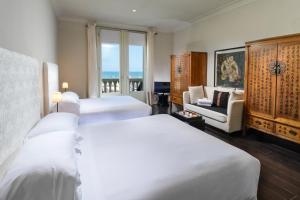Кровать или кровати в номере Hotel Carducci 76