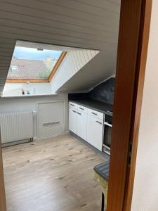 Küche/Küchenzeile in der Unterkunft Rustikale Wohnung mit Garten