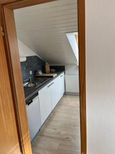 Küche/Küchenzeile in der Unterkunft Rustikale Wohnung mit Garten