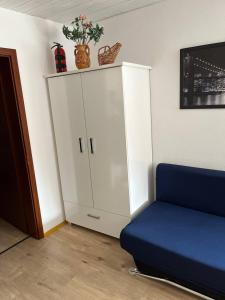 Ein Sitzbereich in der Unterkunft Rustikale Wohnung mit Garten