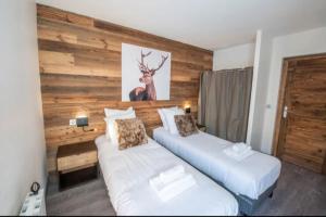 Φωτογραφία από το άλμπουμ του Chalet 24 pers sur la route du tour σε Huez