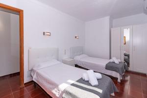 Posteľ alebo postele v izbe v ubytovaní Villa Francesca by Sealand Villas