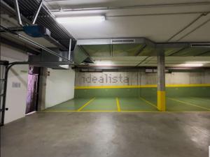 an empty parking garage with a tennis court at Villa mirador de Sanxenxo in Sanxenxo