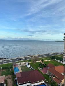 a view of the ocean from a building at 2BR & 3BR Sea View Condos in Dar es Salaam