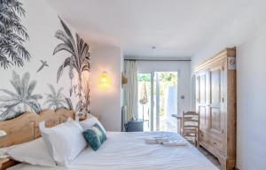 Katil atau katil-katil dalam bilik di Villa Paradis
