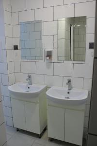Koupelna v ubytování Uneed Rooms Petropavlivska