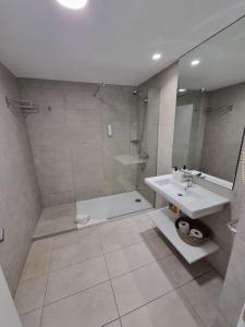 Kylpyhuone majoituspaikassa Holiday Apartments