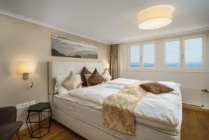 Postel nebo postele na pokoji v ubytování Boutique Hotel Moosegg