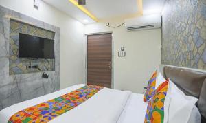 FabHotel The Treenity House客房内的一张或多张床位