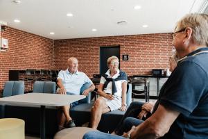 a group of people sitting in a room at Sportium Sportel in Varde