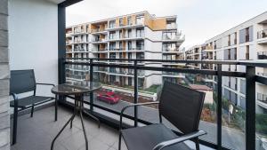 Balkon lub taras w obiekcie Premium in Novum City Center near the train station by Sun & Snow