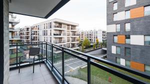Balkon lub taras w obiekcie Premium in Novum City Center near the train station by Sun & Snow