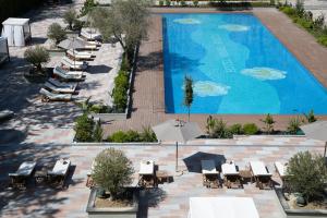 The swimming pool at or close to MarePineta Resort