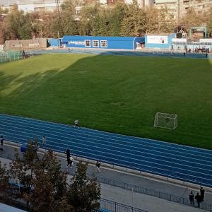 a stadium with a field with a soccer ball at ЖК Молодежный in Almaty