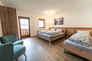 Łóżko lub łóżka w pokoju w obiekcie Apartments Wimpissinger