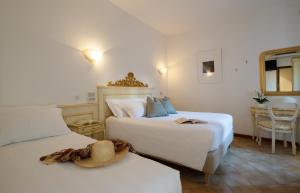 Voodi või voodid majutusasutuse Hotel Guerrini toas