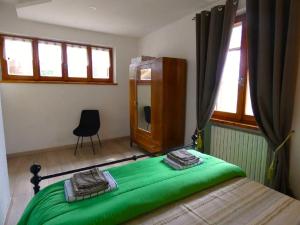 Postel nebo postele na pokoji v ubytování SCAPPO IN UMBRIA, La Casa nel bosco