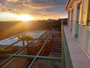 Villa Olivia في سيتشوفلي: منظر من شرفة منزل مع غروب الشمس