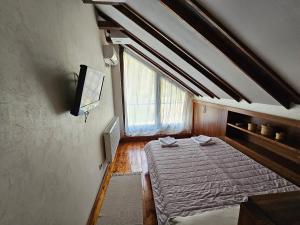 Postel nebo postele na pokoji v ubytování Intimo Spa Grza