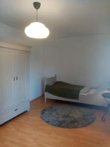 Postel nebo postele na pokoji v ubytování Alte Remise im Herzen von Varel