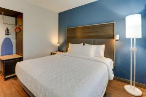 Tru By Hilton Leland Wilmington客房内的一张或多张床位