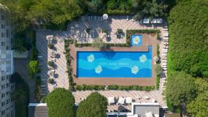 Bazén v ubytování Villa Regina - MarePineta Resort nebo v jeho okolí