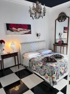Ένα ή περισσότερα κρεβάτια σε δωμάτιο στο B&B dell'orologio