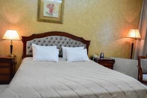 Posteľ alebo postele v izbe v ubytovaní Hotel Feride