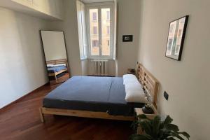Postel nebo postele na pokoji v ubytování "Iris" Milano Lunigiana