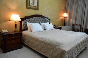 Posteľ alebo postele v izbe v ubytovaní Hotel Feride