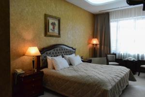 Posteľ alebo postele v izbe v ubytovaní Hotel Feride