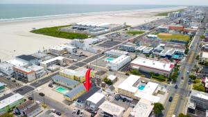 an aerial view of a city next to the beach at 318 E Youngs Ave Unit 3 Serene Seaside Retreat Salty Shore in Wildwood