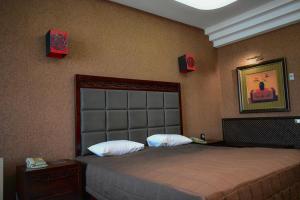 Posteľ alebo postele v izbe v ubytovaní Hotel Feride