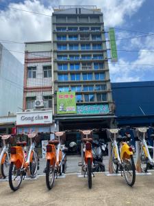 a group of bikes parked in front of a building at Kenting Heng-Chung Art Hostel in Hengchun