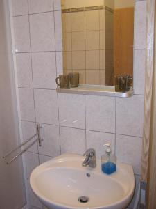 Kúpeľňa v ubytovaní Raday Central Apartment