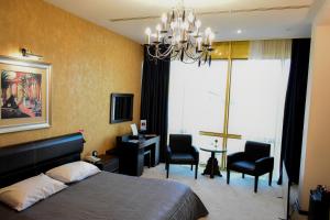 Posteľ alebo postele v izbe v ubytovaní Hotel Feride