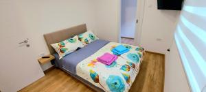 Ένα ή περισσότερα κρεβάτια σε δωμάτιο στο Apartment ENJOY BG