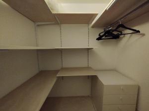 an empty room with shelves and a ceiling at Mantellini 2A in Domodossola