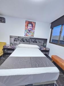 Łóżko lub łóżka w pokoju w obiekcie Apartamentos Benidorm Black