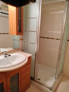 a bathroom with a shower and a sink at Piccadilly Centre Deluxe in Alicante