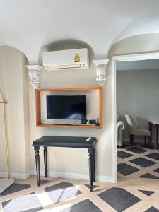 Televiisor ja/või meelelahutuskeskus majutusasutuses Espana Condo Jomtien Pool access By Aey