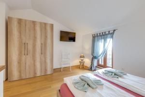 Ένα ή περισσότερα κρεβάτια σε δωμάτιο στο Apartment Dany with Balcony