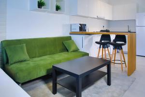 Uma área de estar em Neron Apartments in Caesar Resort & SPA, Long Beach