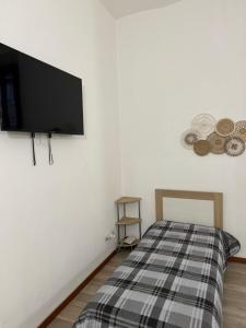 Lova arba lovos apgyvendinimo įstaigoje Appartamento Colomba