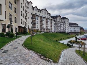 a street in front of a large building at Milmari L29 in Kopaonik