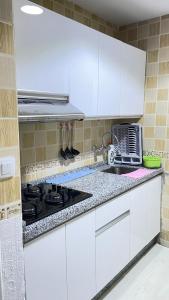 Cuisine ou kitchenette dans l'établissement Tetouan Relax Apartement